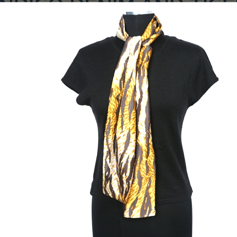 Dolce & Gabbana black knit top with attached tiger strip scarf